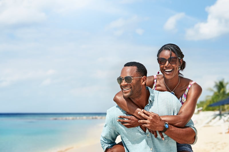 Couple on beach in cozumel mexico