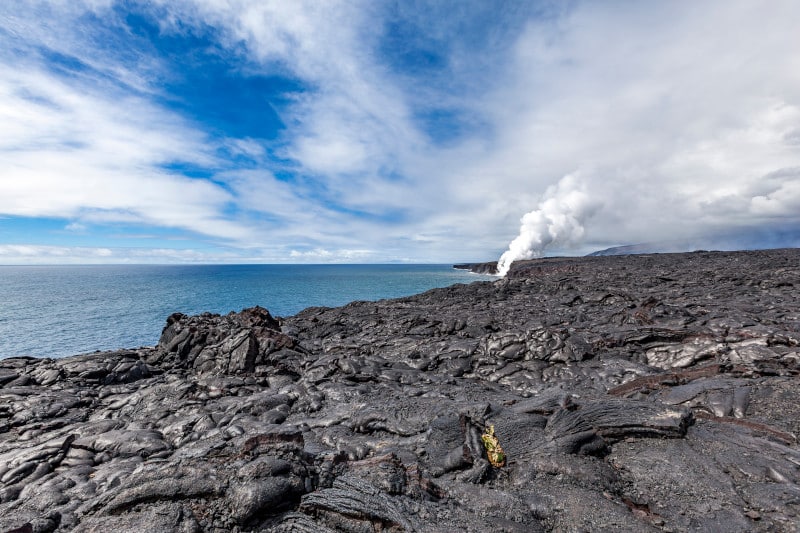lava flow into the ocean at kalapana, big island, hawaii ilands